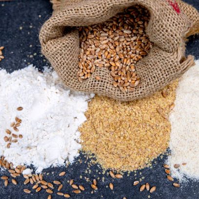Different Flour of Wheat Cereal in Bakery on Black Board